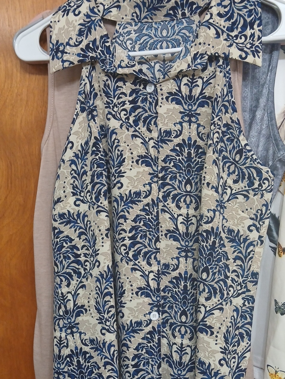 SHEIN Blue Floral Print Button-Up Top on Beige